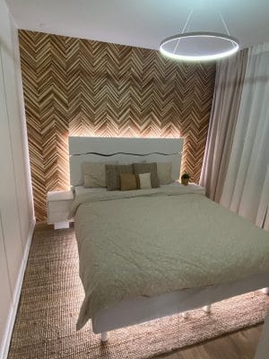 LED strip running around the headboard and underneath the bed.