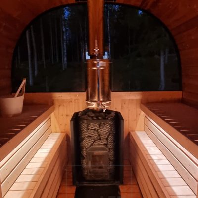 Tunnelmallinen saunan valaistus, led valonauhat valaisemassa epäsuoraa valoa lauteiden alla. Ledstore.fi