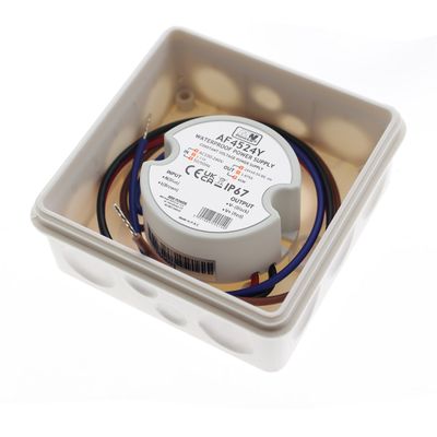 LED-ohjain, rund design, vit kapsling med märkning, anslutna röda, blå och bruna ledare