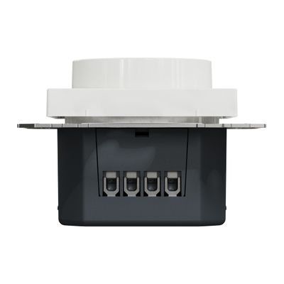 Lähikuva LED-valokatkaisijasta, näkyvät liittimet ja johdotus, taustalla valkoinen seinä.