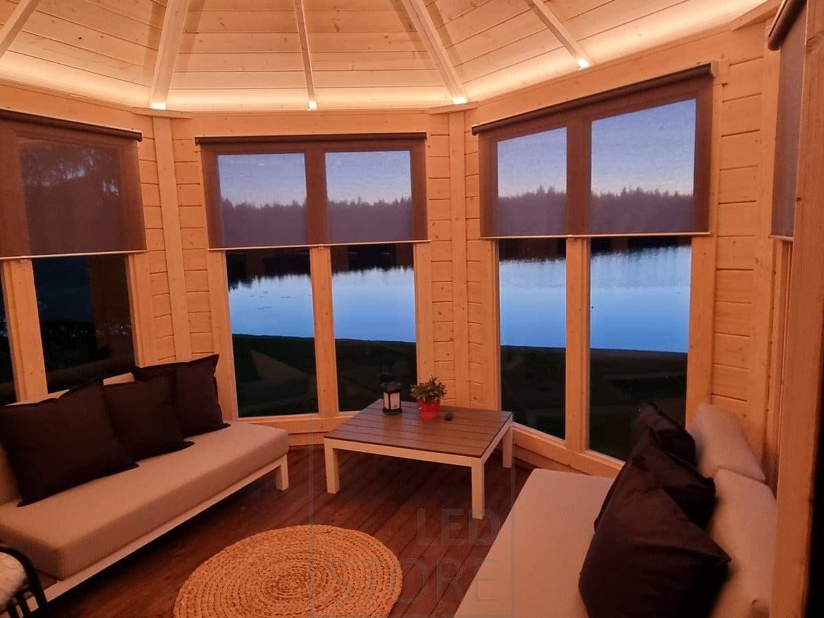 The beautiful ceiling is accentuated with lighting, creating an atmospheric light in the space. Ledstore.fi