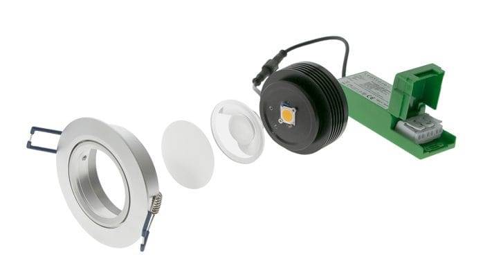 LED alasvalon räjäytyskuva: runko, linssi, LED-moduuli ja vihreä muuntaja.
